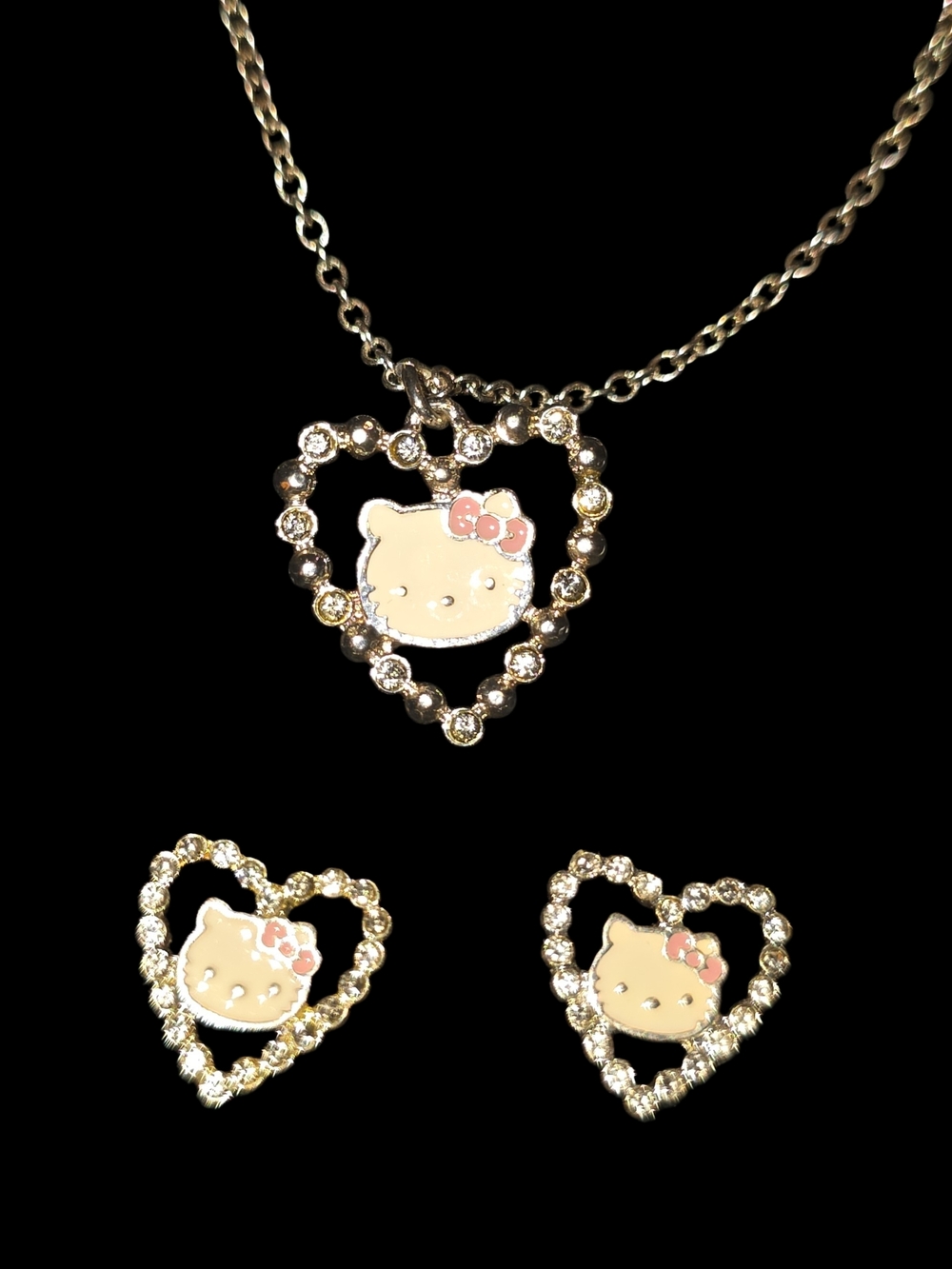 Hello Kitty Gold-Tone Heart Pendant and Stud Earring Set with Pink Bow